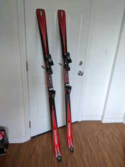 Salmon skis with binding, 66", very new.
