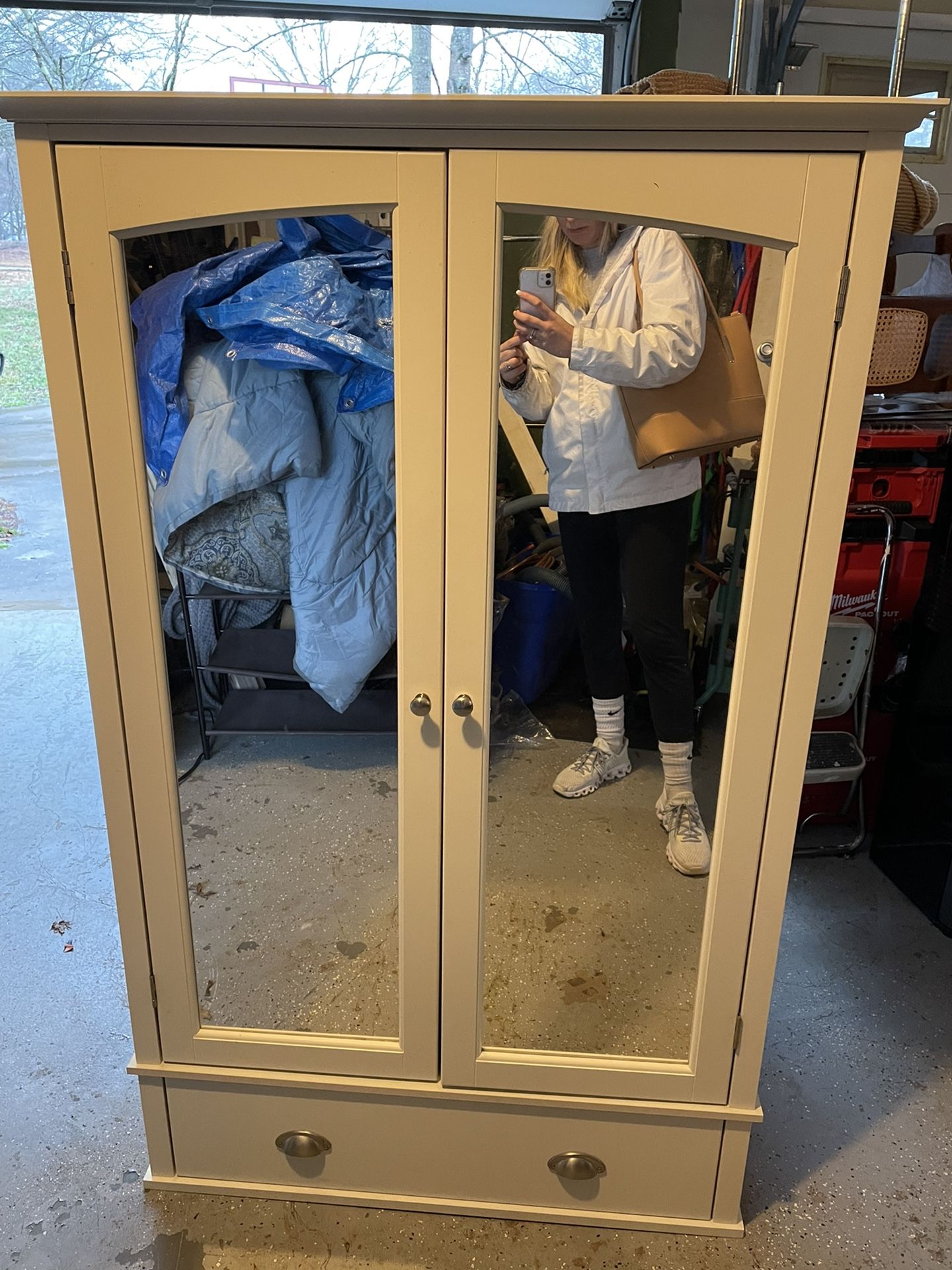 Mirrored Armoire With Shelves And Drawer