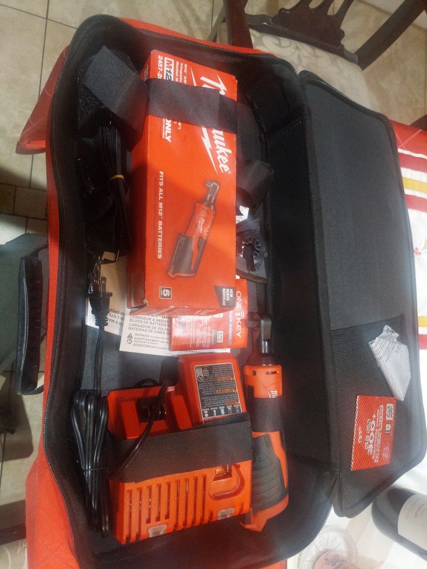 Milwaukee New Ratchet M2 3/8 New Charger And Ne Bag 120.00