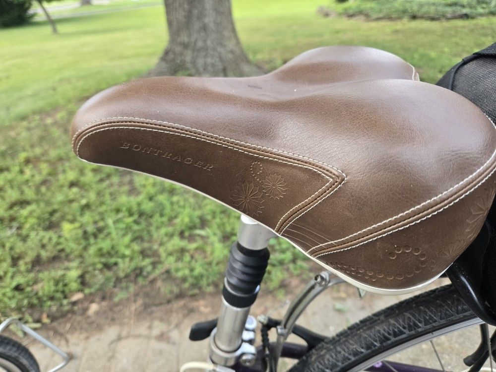 Bontrager TREK Bicycle With Engraved Leather Seat, Helmet, And Trunk Bag