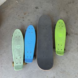 Penny boards and a skateboard
