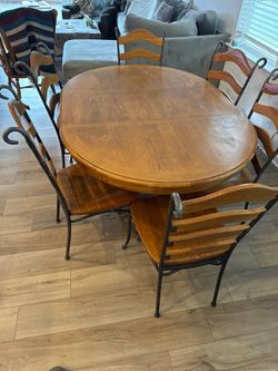 Wood Oval Dining Room Table with Six Chairs
