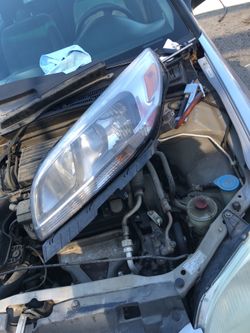 2015 Chevy Malibu left hand headlight