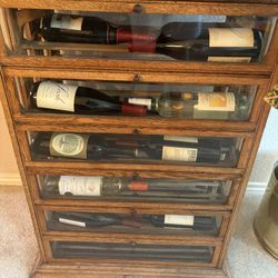 Antique Ribbon Cabinet That Makes A Great Wine Rack