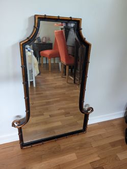 Beveled glass and iron mirror
