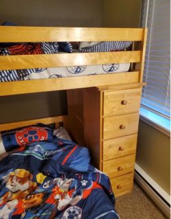 Twin bunk beds with desk, dresser