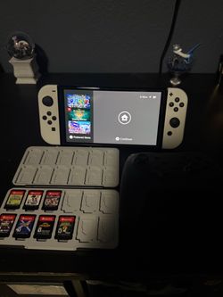 Nintendo Switch OLED with 4 Game & Controller