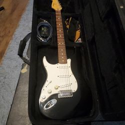 Left-handed Fender Squire stratocaster with amp ready to go