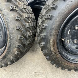 Two ATV rims and tires got Bigger Rims And Tires