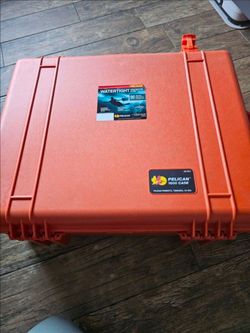 New orange Pelican 1600 Protector Case with Foam