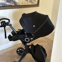 Stokke Xplory Stroller With Car Seat And Sibling Board