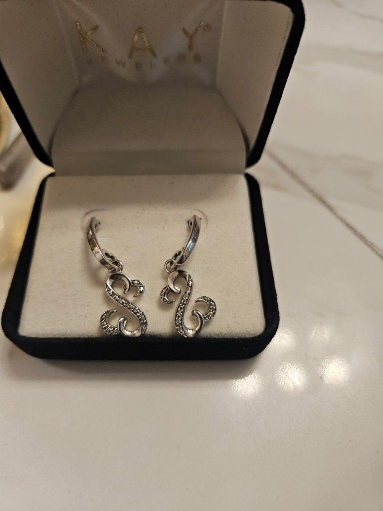 Set Of Silver Earrings