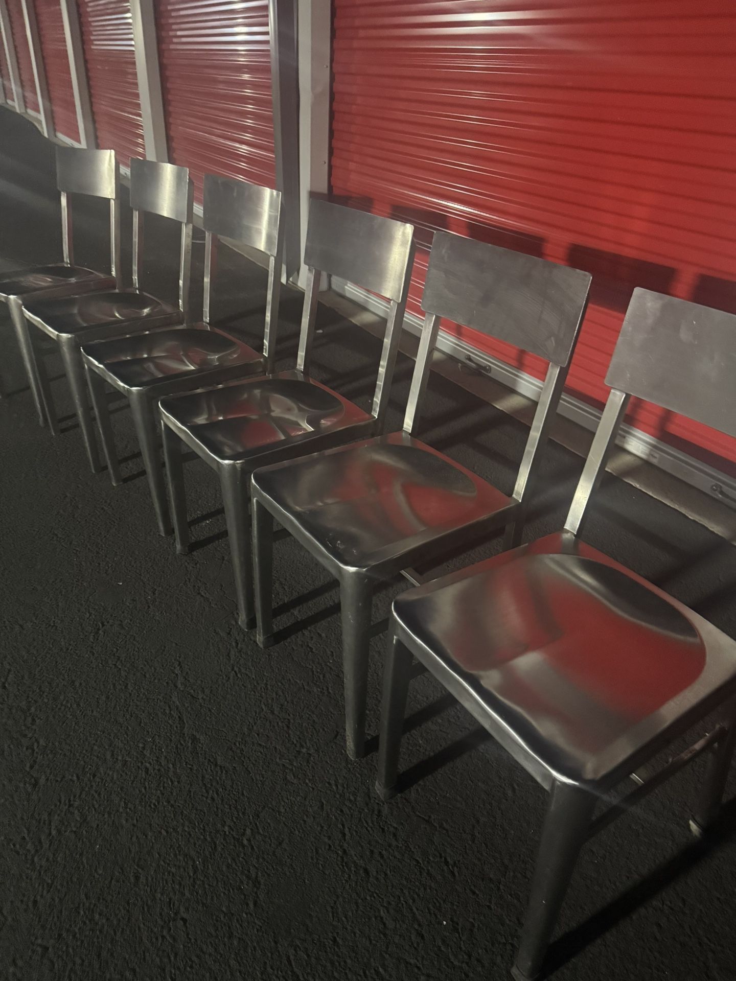 $50 Each Chair / $50 Cada Silla : This is a stainless steel chair, which is known for its durability and industrial aesthetic