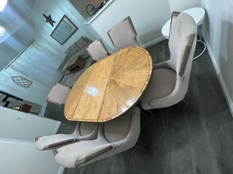 Round Wood Dining Table with 6 Upholstered Chairs