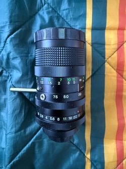 Toyo Optics TV Zoom Lens with a focal range of 12.5-75mm and a maximum aperture of f/1.8