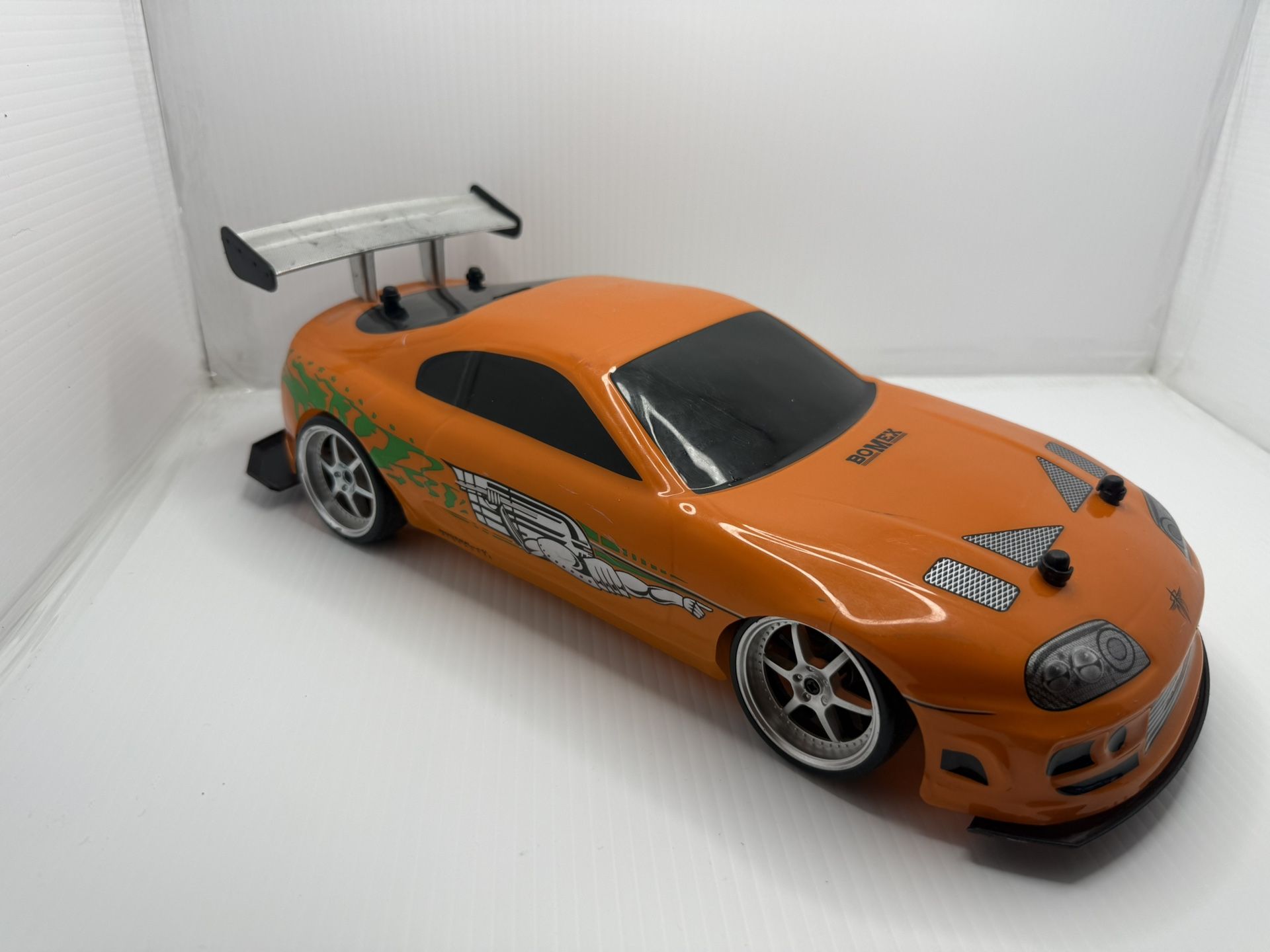 ORANGE 1995 TOYOTA SUPRA JADA TOYS RC CAR-NO REMOTE