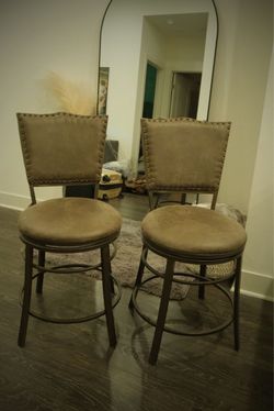 ORIGINALLY $500- 2 Grey Barstools(Metal base and upholstered cushions)