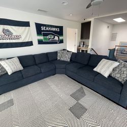 Living Spaces Sectional With Fold Out Bed 