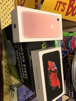 Empty Apple iPhone 7 pink box and iPhone 6s Plus box
