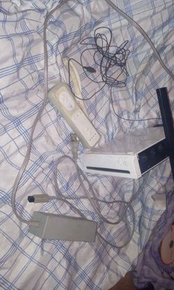 Complete Wii Set(Comes with power cable, sensor and controller plus NFL 09 All-play)
