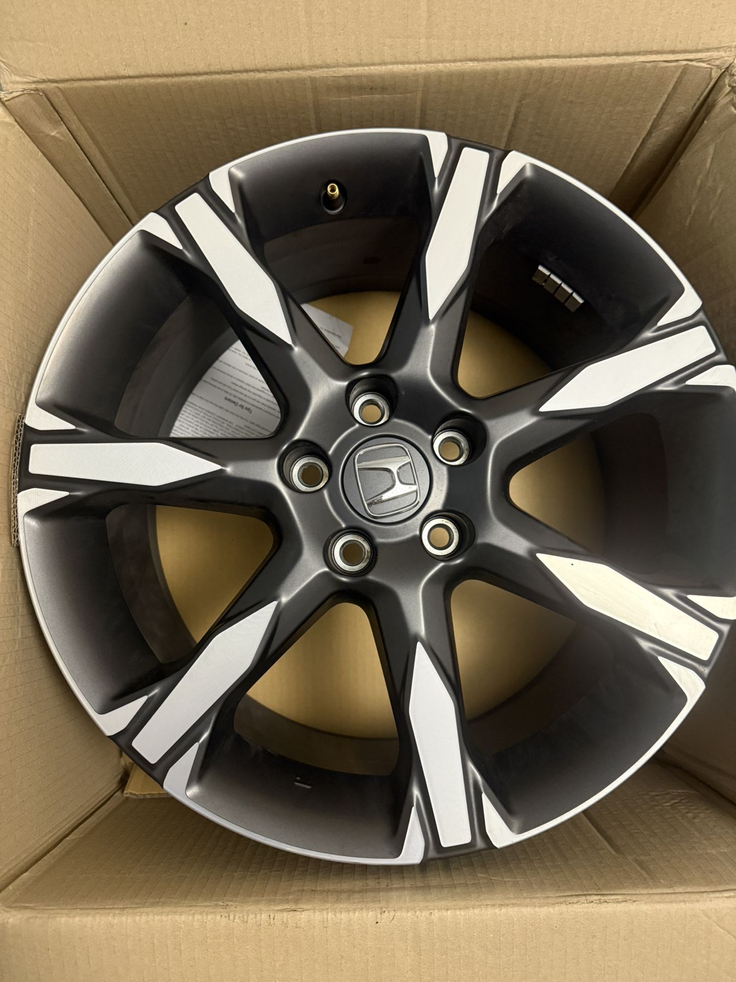 Four 11th gen Honda Civic OEM wheels