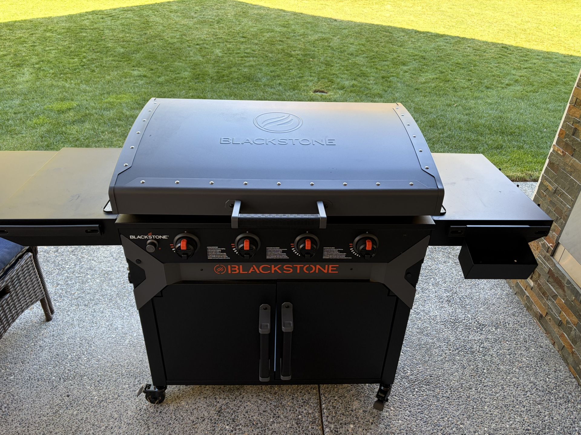 Blackstone Iron Forged 4 Burner Liquid Propane Outdoor Griddle with Hood