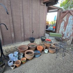 Pottery/terracotta plant holders and hangers