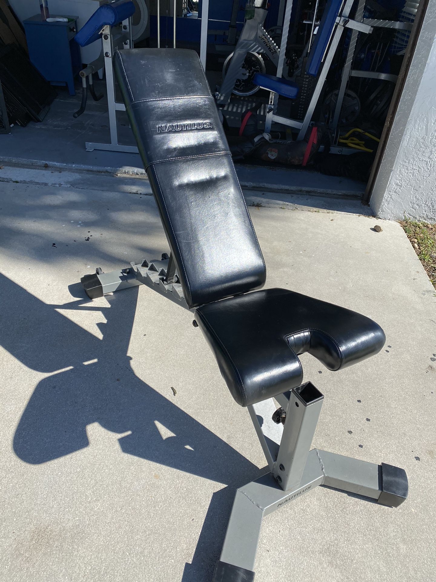 Nautilus workout bench with preacher