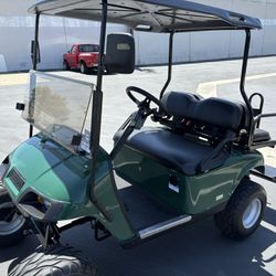 2006 E-Z-GO TXT PDS 4-Passenger Lifted 36-Volt Street Legal Golf Cart