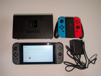 Nintendo Switch Bundle + 4 Joy-Cons, Dock , Case and 128GB microSD