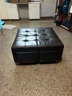 Faux leather ottoman with storage