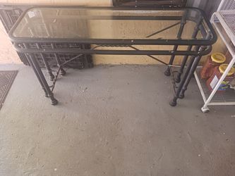 Metal table with glass top 65" x 16" x 26"