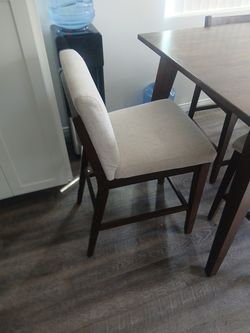 Brown kitchen table with 6 chairs