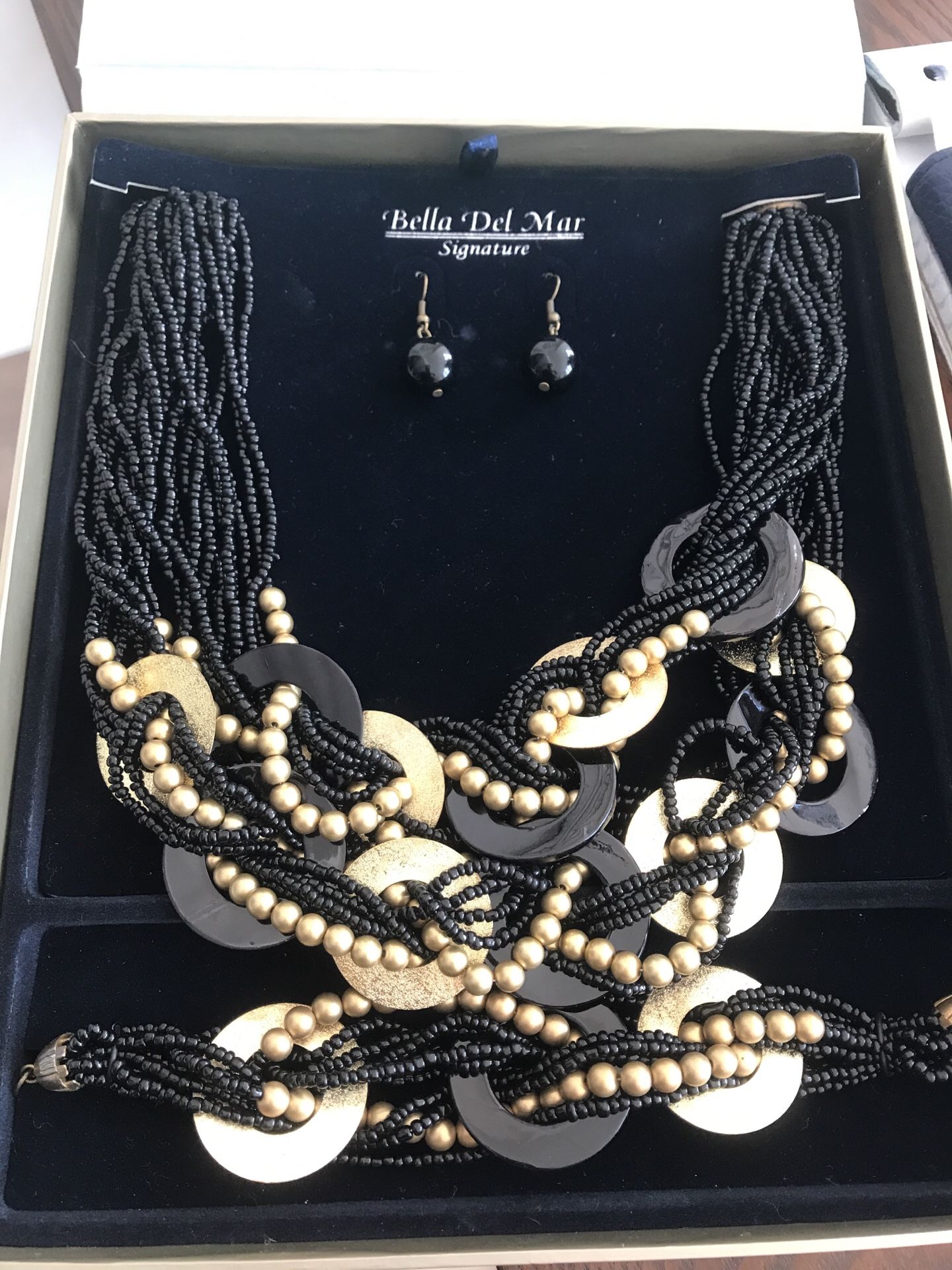 Black and gold statement necklace and matching bracelet with earrings
