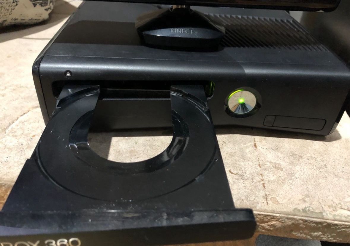 Xbox 360 with Kinect + Controller + 9-Game Bundle