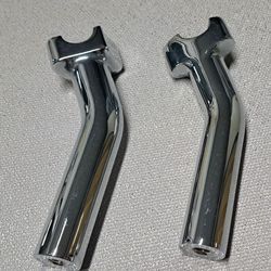Chrome pull back risers for a Harley Davidson