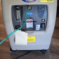 Invacare PORTABLE OXYGEN machine