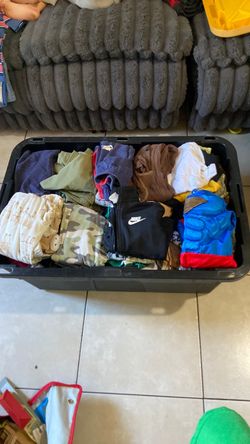 Bin full of clothes