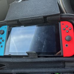 Nintendo switch w/ Case and 2 extra controllers 