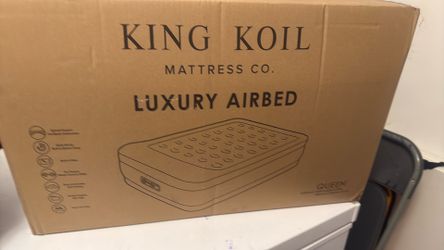 Brand new queen, size air bed, luxury