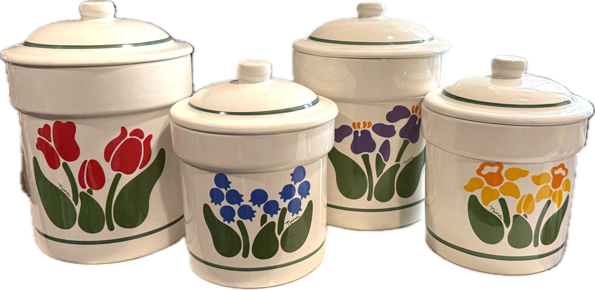 Complete Set of Vintage 1983 Treasure Craft Nina Canister Set. They are in wonderful condition - 4 Cannisters / 4 Lids  No Chips or Cracks 