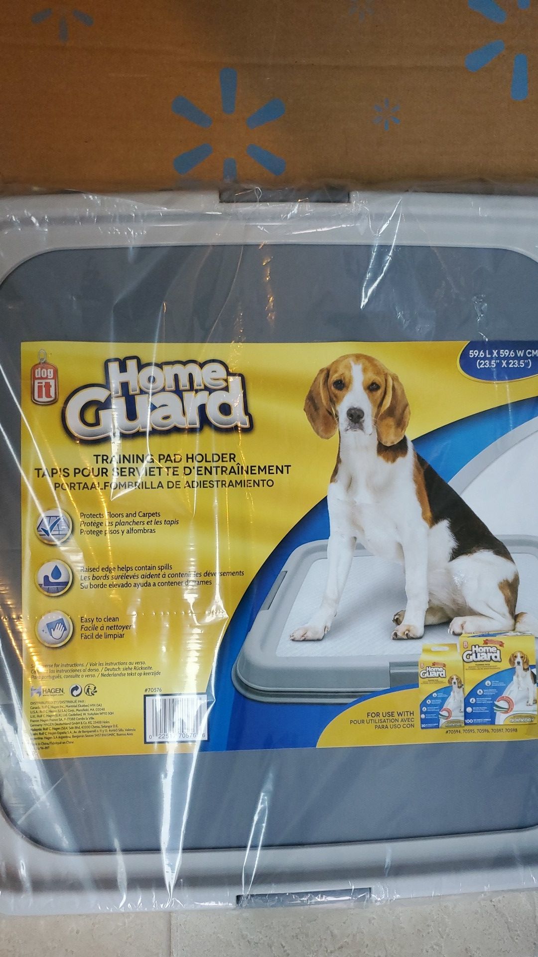 Dog training pad holder