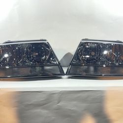 99-04 Jeep Grand Cherokee Smoked housing with clear and amber headlights