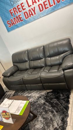 Fall clearance sale! Madrid, gray leather reclining sofa and loveseat set only $1099. Easy finance option and full service delivery available.