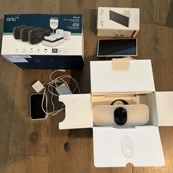Arlo Pro 4 Security Camera Bundle With Flood Light Camera & Solar Panel