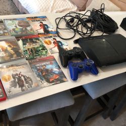 Sony Playstation PS3 Console with 11 games with contollers & lots of wires.