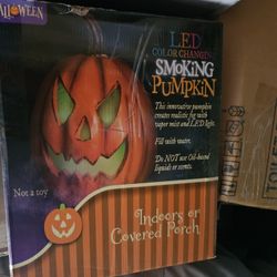 LED Color Changing Smoking Pumpkin" designed for Halloween decoration.