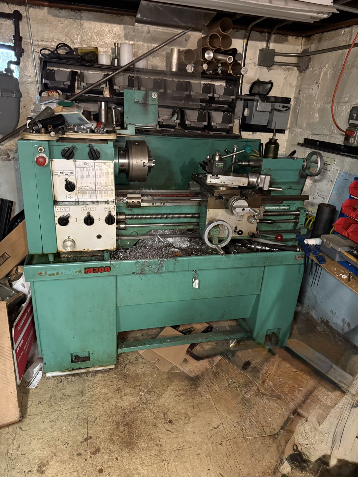 HARRISON M300 LATHE WITH VARIOUS ADAPTERS . BUYER MUST DISASSEMBLE, PICK UP AND DELIVER. $1000.00 OR BEST OFFER.