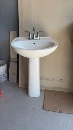 Pedestal sink with chrome