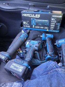 Brand new Hercules impact gun, 3/8 drive power ratchet, 2 right angle die grinders, 20 volt 5ah battery, & 12 volt 2 ah battery